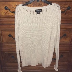 Off white sweater with threading and design